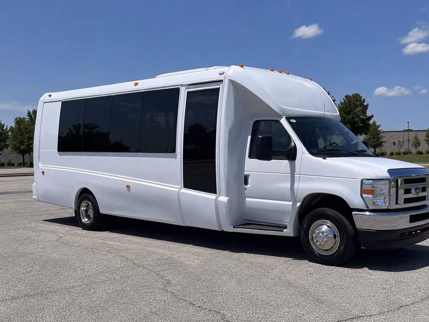 Wedding guests seated inside a party bus serving Little Rock